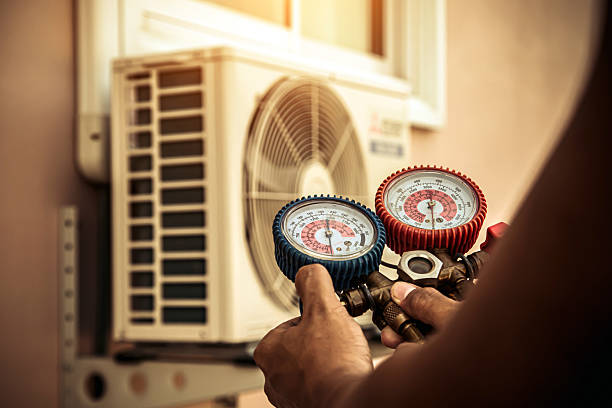 Professional Hvac technician working in Holtsville, NY